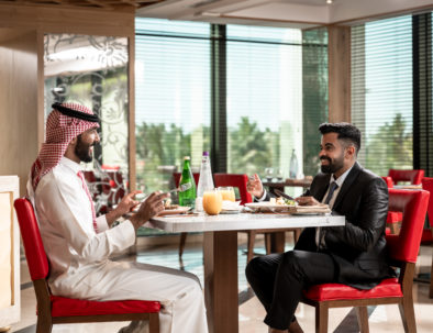 Business men having lunch in Le Voyageur